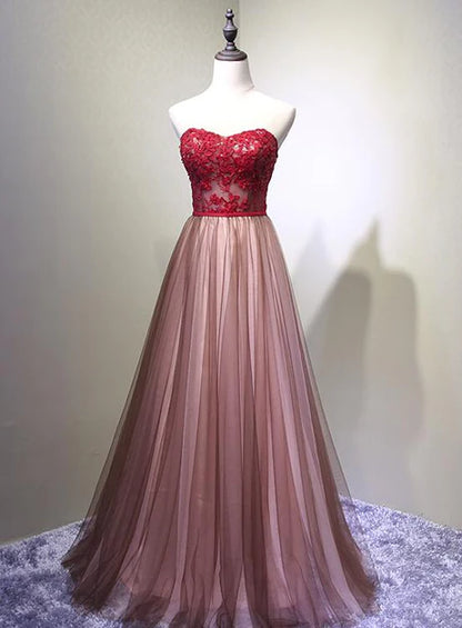 A unique/beautiful burgundy chiffon ball dress with decal crystal sequins and sleeveless evening dress