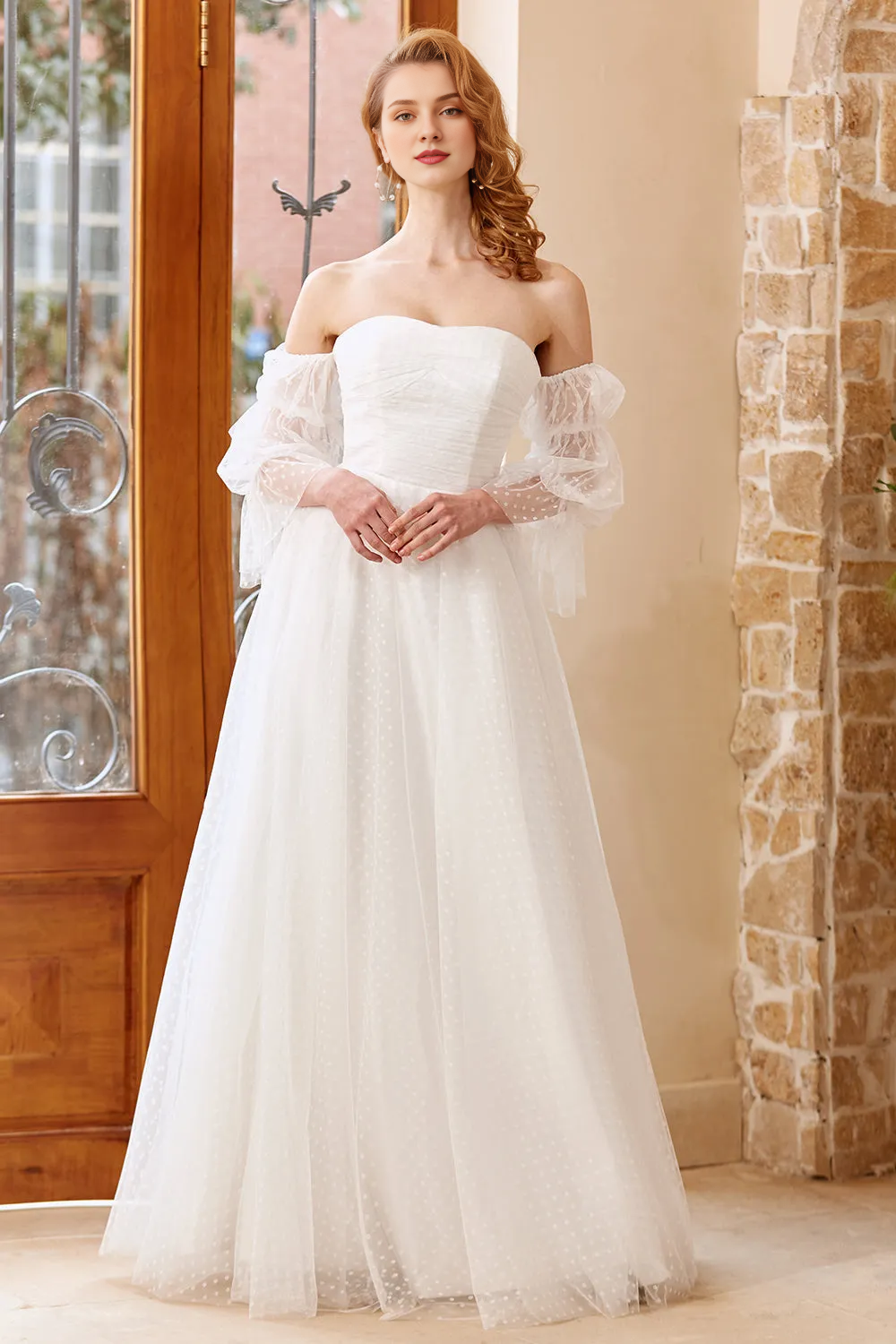 White chiffon off shoulder and floor length wedding dress