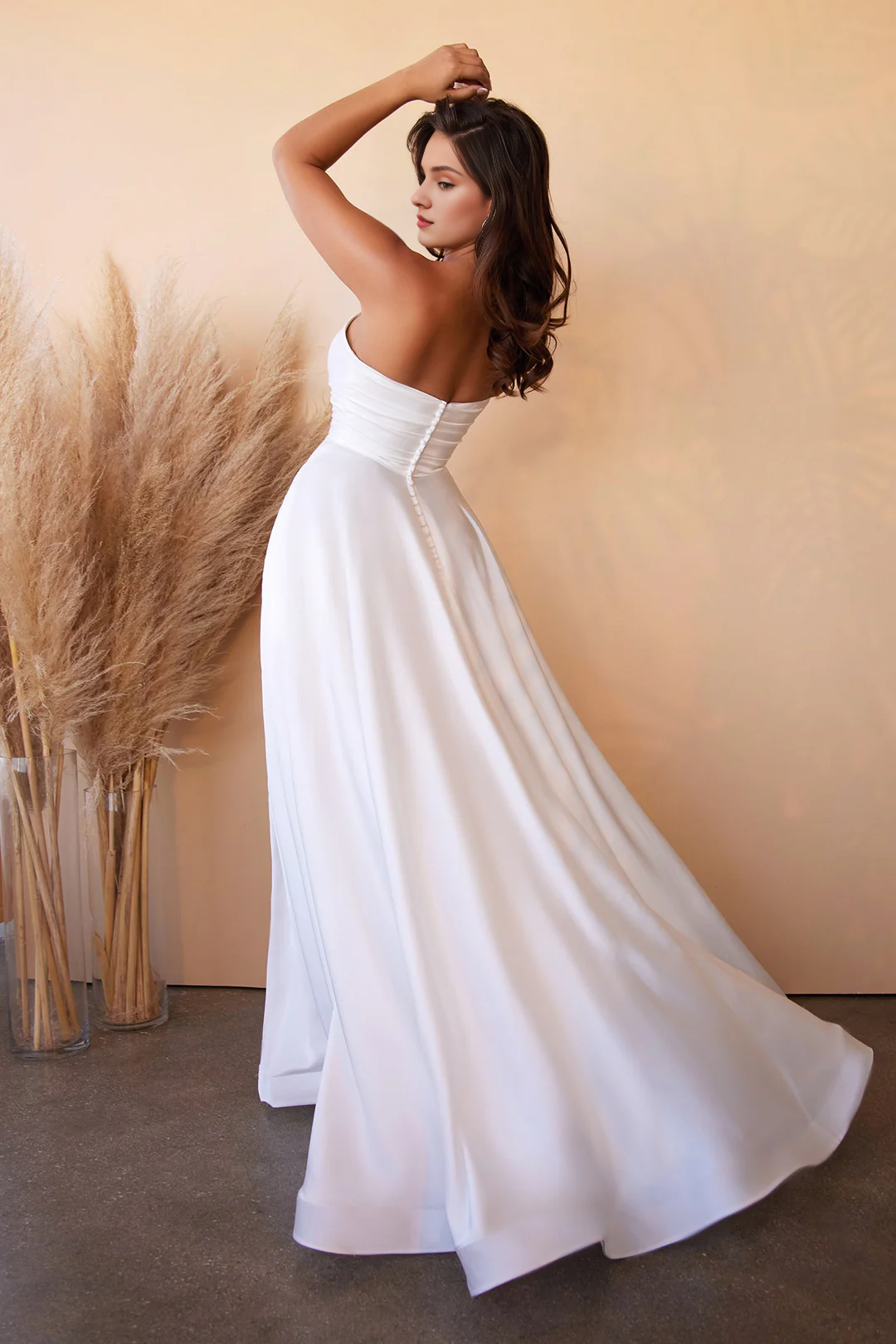 White satin strapless wedding dress