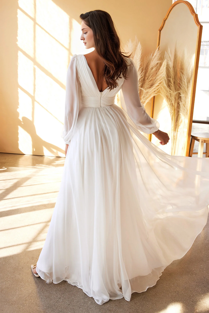 Off white long sleeved chiffon and floor length dress