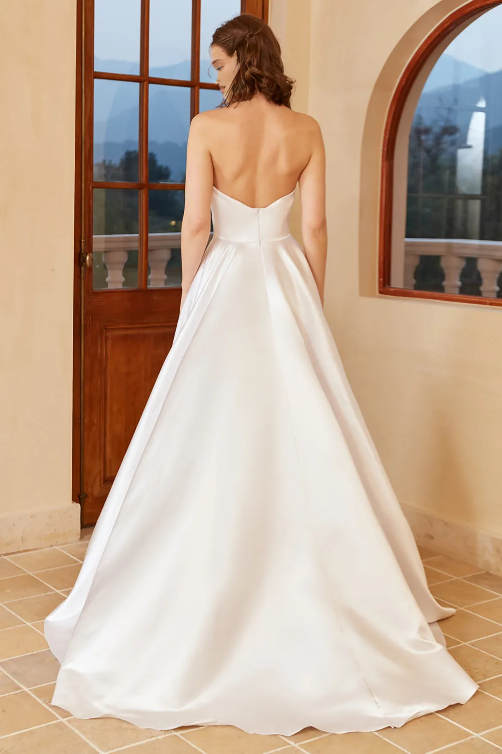 White slit satin sweetheart and floor length wedding dress