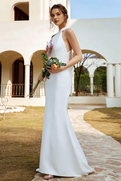 White fishtail backless and floor length wedding dress