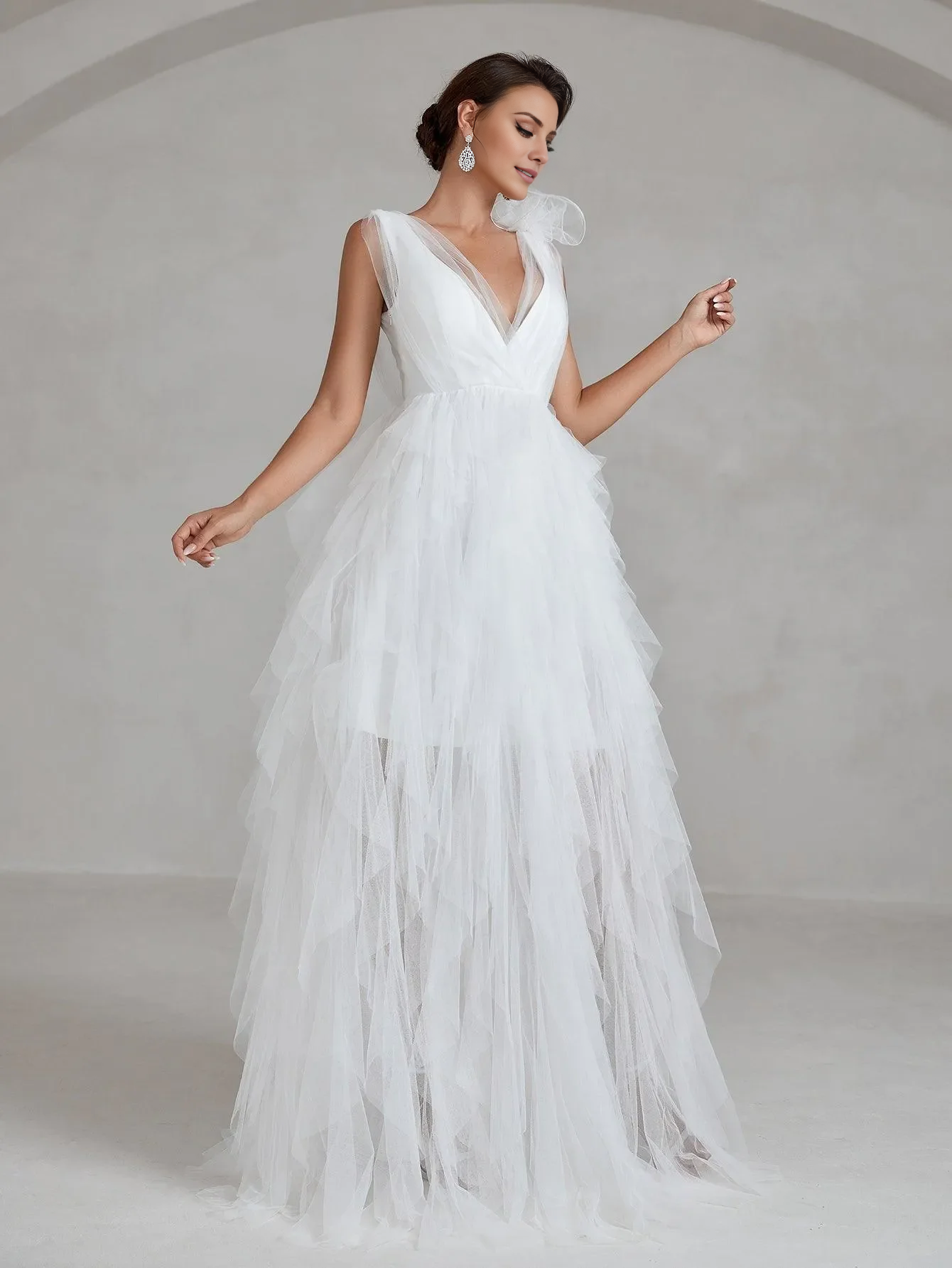 Deep V-neck sleeveless mesh cover and floor length wedding dress