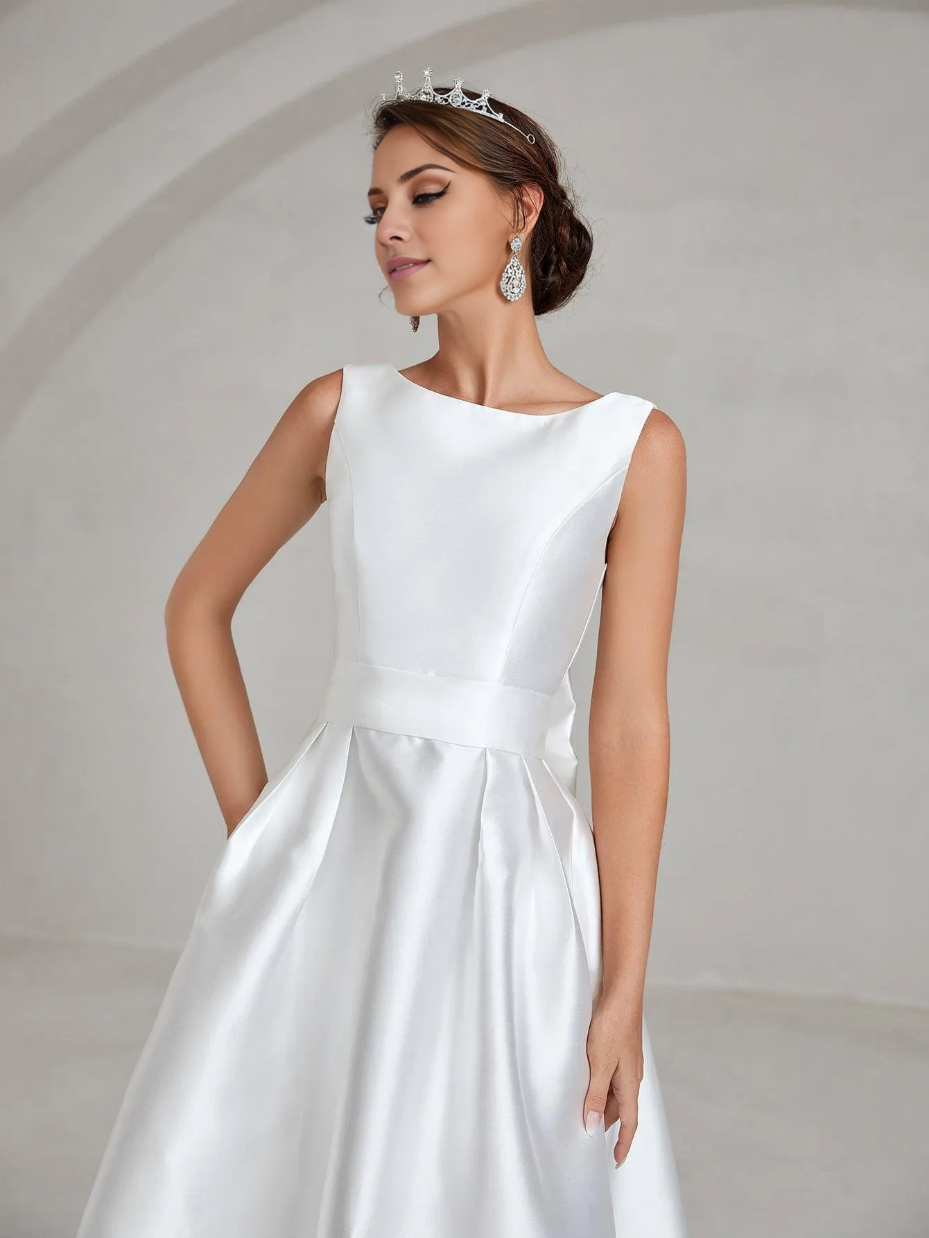 Elegant and minimalist backless satin and floor length wedding dress