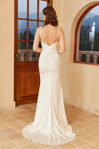 White thin shoulder strap with exposed back and floor minimalist wedding dress