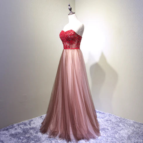 A unique/beautiful burgundy chiffon ball dress with decal crystal sequins and sleeveless evening dress