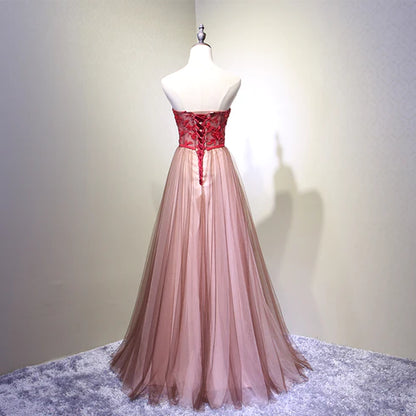 A unique/beautiful burgundy chiffon ball dress with decal crystal sequins and sleeveless evening dress