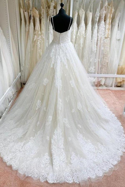 Elegant and noble tulle lace spaghetti strap fluffy and ground length wedding dress