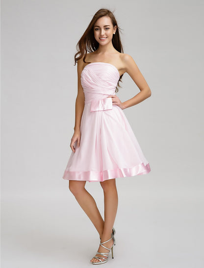 A-Line Strapless Knee Length Chiffon Bridesmaid Dress with Bow(s) / Criss Cross