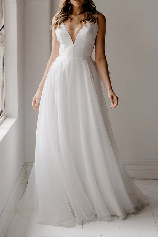 A-shaped deep V-neck ivory minimalist Bohemian style wedding dress with backless bride dress
